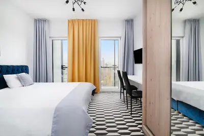 Łóżko lub łóżka w pokoju w obiekcie Apartamenty Prymasa Residence