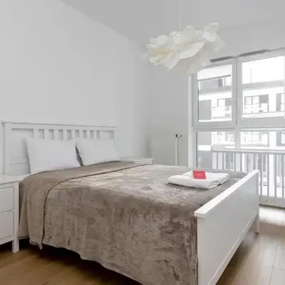 Rozłogi Sunny Apartment by BookingHost