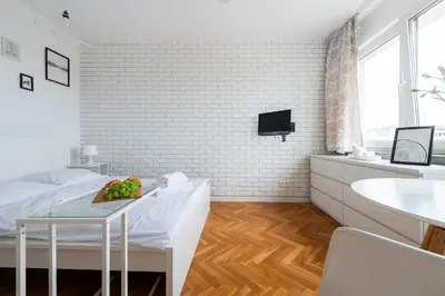 Łóżko lub łóżka w pokoju w obiekcie Tamka 40 Prywatne mieszkanie w pobliżu Starego Miasta i Stadionu Narodowego 100m od metra Nowy Świat Samodzielne Zameldowanie! Self Check-in System!