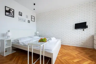 Łóżko lub łóżka w pokoju w obiekcie Tamka 40 Prywatne mieszkanie w pobliżu Starego Miasta i Stadionu Narodowego 100m od metra Nowy Świat Samodzielne Zameldowanie! Self Check-in System!