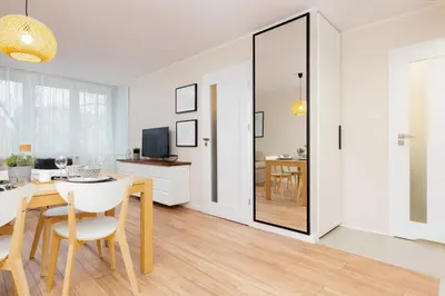 Telewizja i/lub zestaw kina domowego w obiekcie Apartments Warsaw Królewska by Noclegi Renters