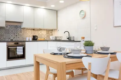 Kuchnia lub aneks kuchenny w obiekcie Apartments Warsaw Królewska by Noclegi Renters