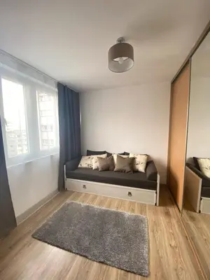 Łóżko lub łóżka w pokoju w obiekcie Vicky - New Apartment Centrum Srodmiescie