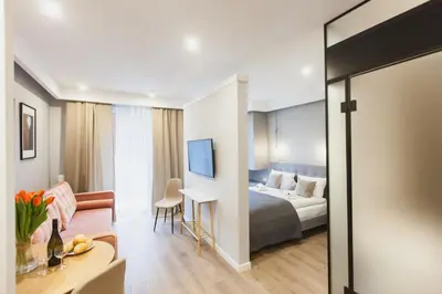 Łóżko lub łóżka w pokoju w obiekcie City Break Atelier Praga Apartamenty