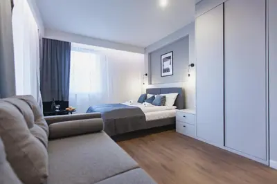 Łóżko lub łóżka w pokoju w obiekcie City Break Atelier Praga Apartamenty
