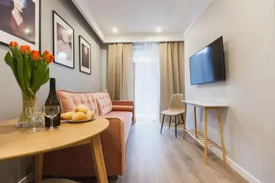 Telewizja i/lub zestaw kina domowego w obiekcie City Break Atelier Praga Apartamenty