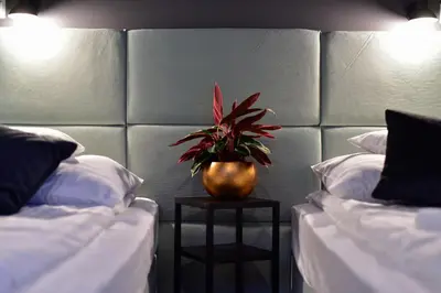 Łóżko lub łóżka w pokoju w obiekcie Candy Apartments Warszawa