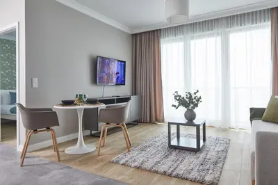 Telewizja i/lub zestaw kina domowego w obiekcie Metro Imielin Apartments by BookingHost