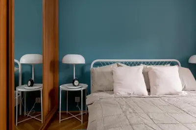 Łóżko lub łóżka w pokoju w obiekcie Saska Kępa Modern Apartment by BookingHost