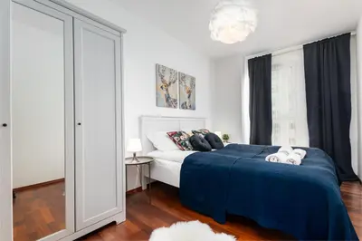 Łóżko lub łóżka w pokoju w obiekcie Bukowińska 22 by Homeprime