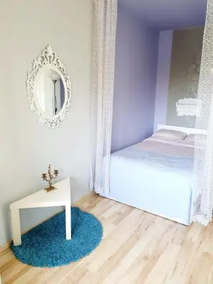 Łóżko lub łóżka w pokoju w obiekcie Center apartment, balcony Twarda