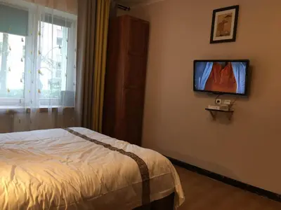 Łóżko lub łóżka w pokoju w obiekcie Travel Apartment