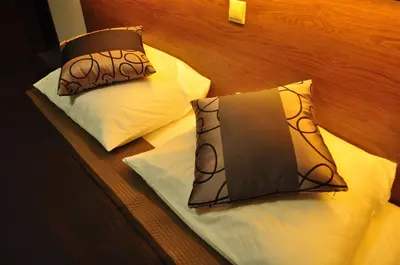 Łóżko lub łóżka w pokoju w obiekcie Villa B&B