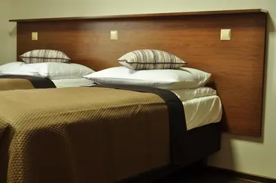 Łóżko lub łóżka w pokoju w obiekcie Villa B&B
