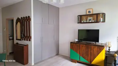 Telewizja i/lub zestaw kina domowego w obiekcie Green Wilanów Apartment with free parking