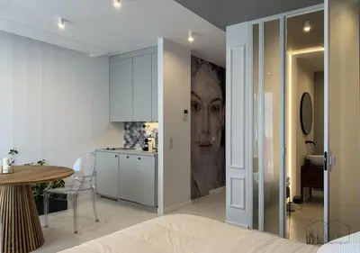Łóżko lub łóżka w pokoju w obiekcie IVY Warsaw Studio