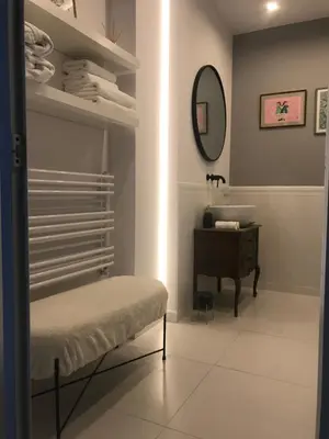 Łóżko lub łóżka w pokoju w obiekcie IVY Warsaw Studio