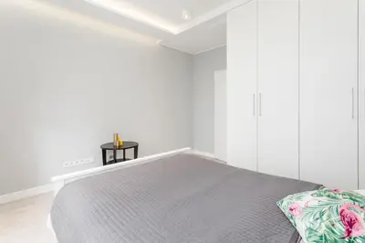 Łóżko lub łóżka w pokoju w obiekcie Chill Apartments Mokotów Residence