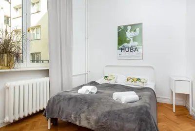 Łóżko lub łóżka w pokoju w obiekcie Hoża 35 by Homeprime