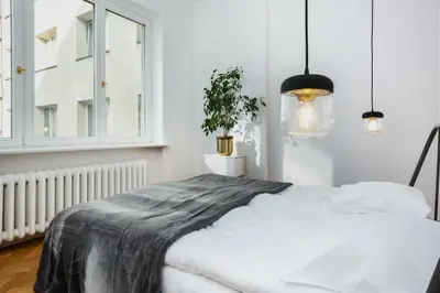 Łóżko lub łóżka w pokoju w obiekcie Hoża 35 by Homeprime