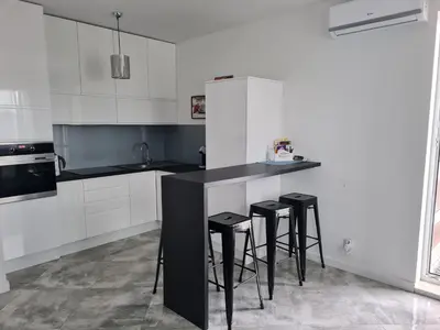 Kuchnia lub aneks kuchenny w obiekcie Apartament na Lazurowej