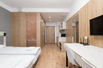 Łóżko lub łóżka w pokoju w obiekcie RentPlanet - Apartamenty Wolska