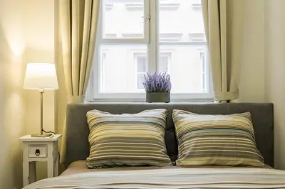 Łóżko lub łóżka w pokoju w obiekcie Apartamenty-MI Happy