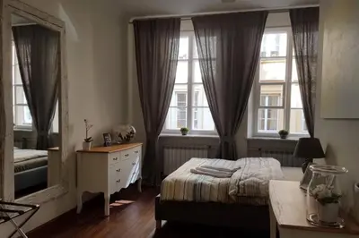 Łóżko lub łóżka w pokoju w obiekcie Apartamenty-MI Happy