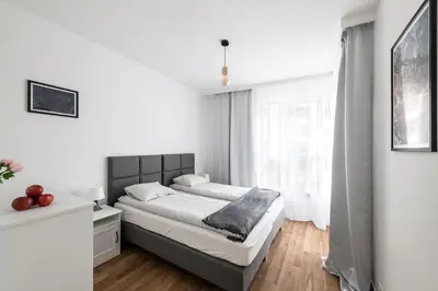 Łóżko lub łóżka w pokoju w obiekcie Warsaw - Aparts Włochy