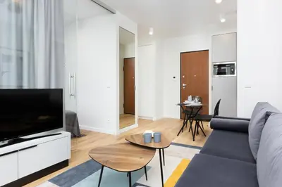 Telewizja i/lub zestaw kina domowego w obiekcie Apartments Browary Warszawskie by Noclegi Renters
