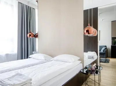 Łóżko lub łóżka w pokoju w obiekcie Wynalazek 2 by Homeprime