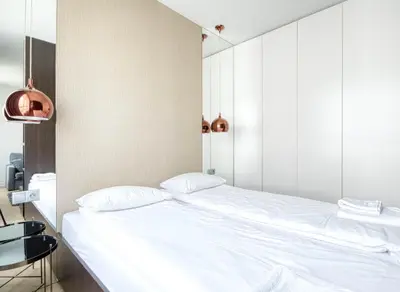 Łóżko lub łóżka w pokoju w obiekcie Wynalazek 2 by Homeprime