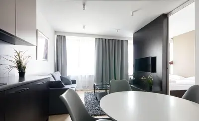 Telewizja i/lub zestaw kina domowego w obiekcie Wynalazek 2 by Homeprime