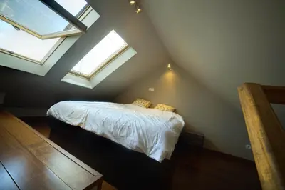 Łóżko lub łóżka w pokoju w obiekcie Apartament Nowy Świat