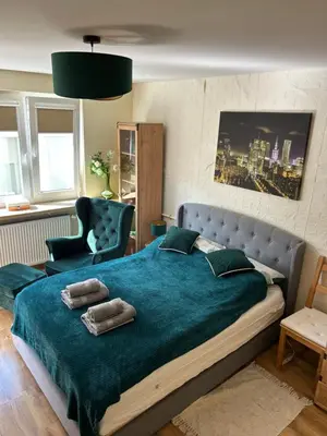Łóżko lub łóżka w pokoju w obiekcie Apartament w Centrum Warszawy I