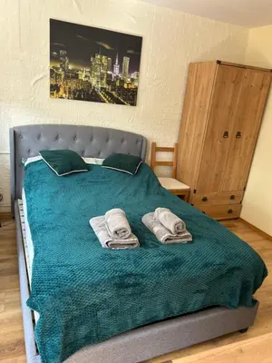Łóżko lub łóżka w pokoju w obiekcie Apartament w Centrum Warszawy I