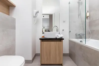Łazienka w obiekcie Sławińska Apartment Warsaw Wola by Noclegi Renters