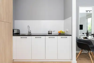 Kuchnia lub aneks kuchenny w obiekcie Sławińska Apartment Warsaw Wola by Noclegi Renters