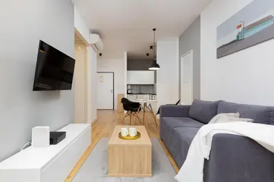 Telewizja i/lub zestaw kina domowego w obiekcie Sławińska Apartment Warsaw Wola by Noclegi Renters