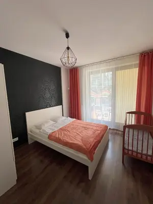 Łóżko lub łóżka w pokoju w obiekcie Apartamenty Warszawskie delux Siedmiogrodzka