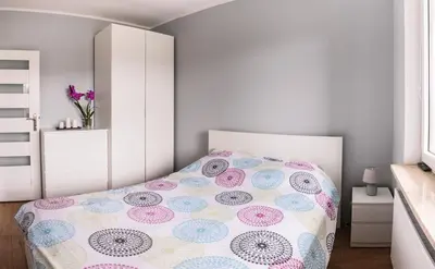 Łóżko lub łóżka w pokoju w obiekcie Marywilska apartment
