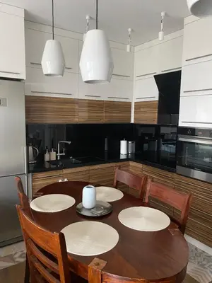 Kuchnia lub aneks kuchenny w obiekcie Błękitny Apartament - Wilanów