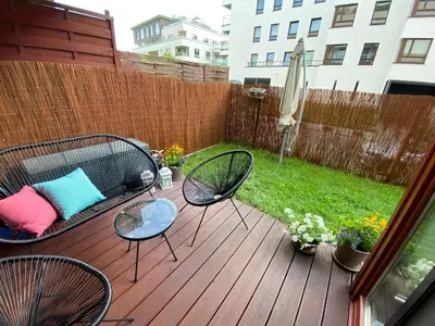 Ogród w obiekcie Błękitny Apartament - Wilanów