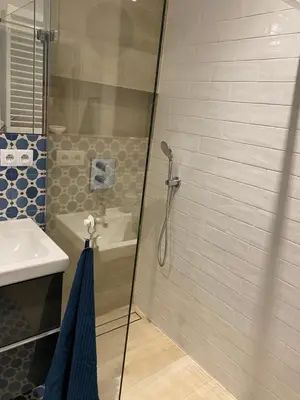 Łazienka w obiekcie Błękitny Apartament - Wilanów