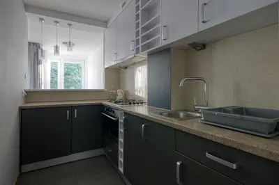 Kuchnia lub aneks kuchenny w obiekcie aleja 3 maja 7B by Homeprime