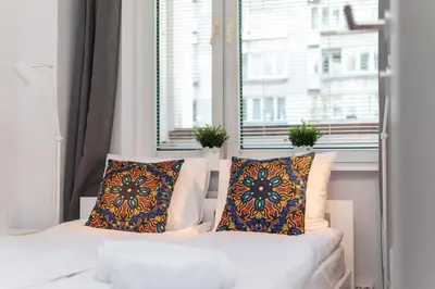 Łóżko lub łóżka w pokoju w obiekcie Królewska 43 by Homeprime