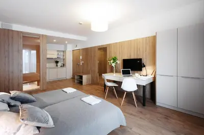 Telewizja i/lub zestaw kina domowego w obiekcie Wolska Residence
