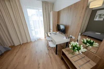 Telewizja i/lub zestaw kina domowego w obiekcie Wolska Residence