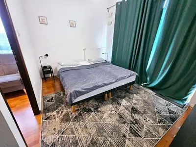 Łóżko lub łóżka w pokoju w obiekcie FIRST -- Green Żoliborz apartment 3