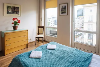 Łóżko lub łóżka w pokoju w obiekcie Apartment Metro Politechnika
